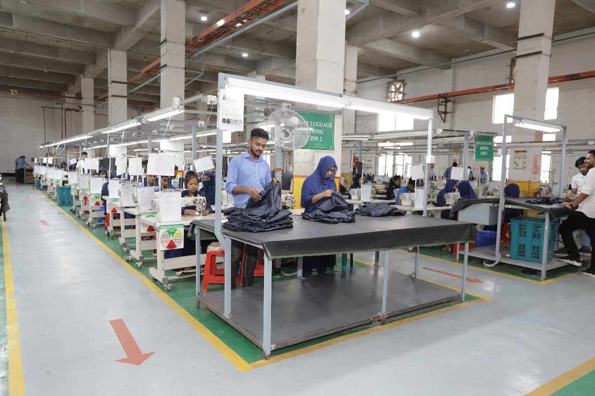 Wide view of the sewing floor at the Maynalucy production center in Dhaka